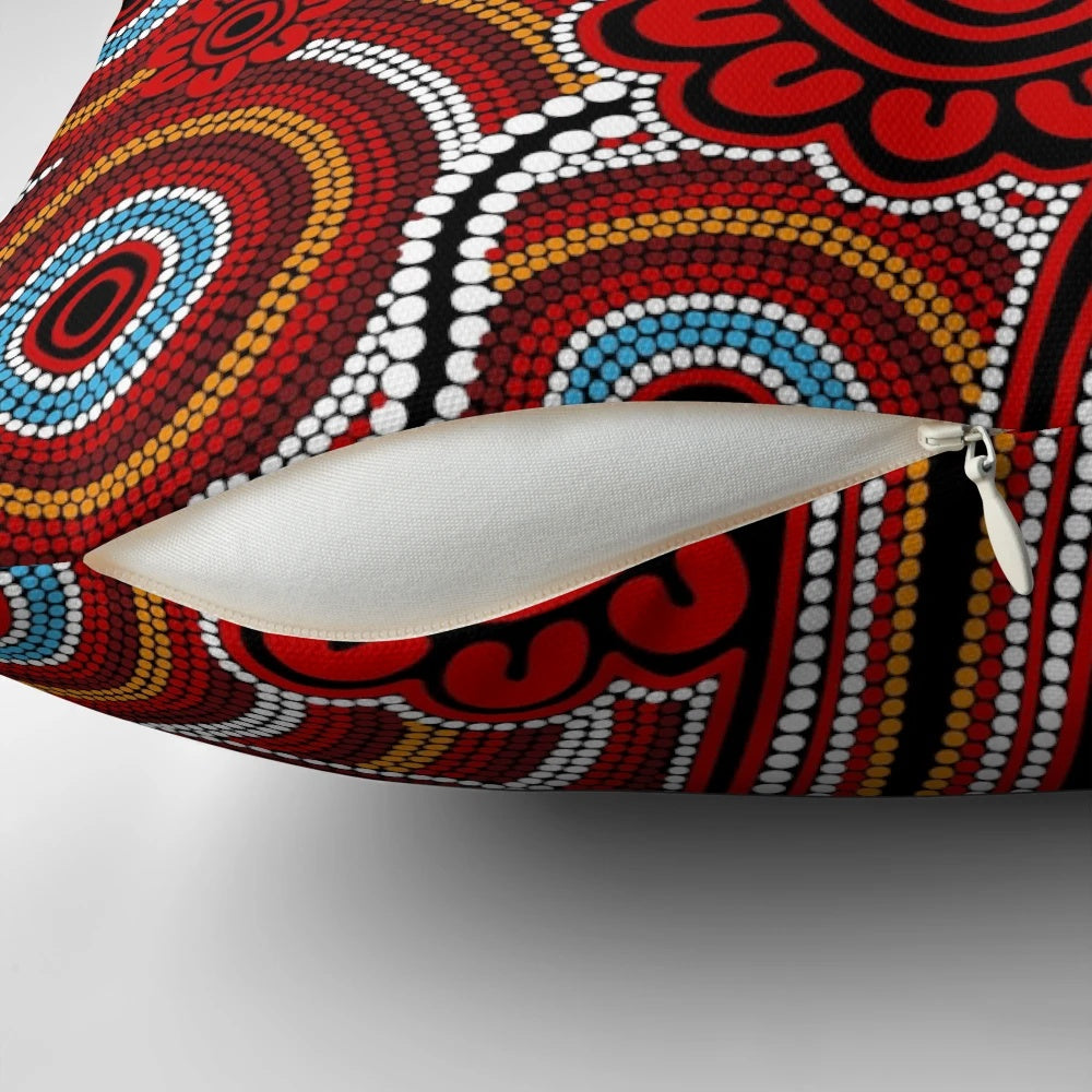 Pillow featuring aboriginal-inspired dot art design