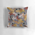 Pillow featuring vibrant aboriginal-inspired artwork with kangaroos, dots, and Australian landscape elements.