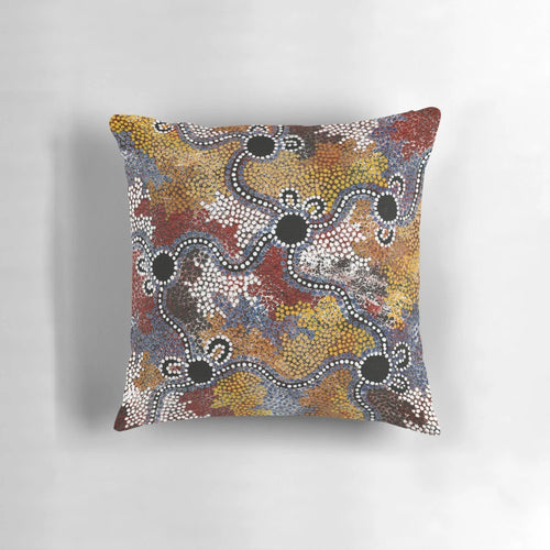 Pillow featuring vibrant aboriginal-inspired artwork with kangaroos, dots, and Australian landscape elements.