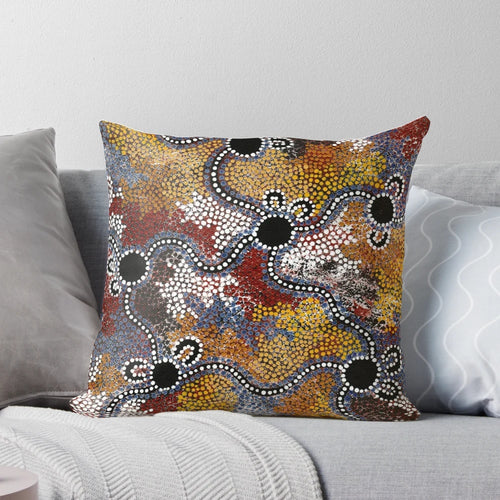 Pillow featuring vibrant aboriginal-inspired artwork with kangaroos, dots, and Australian landscape elements.