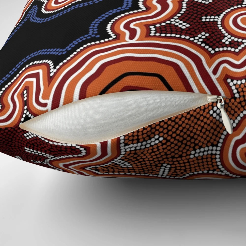 Authentic aboriginal-inspired blue and ochre art pillow featuring traditional Australian aboriginal dot and pathway designs