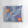 Authentic aboriginal-inspired blue pillow with traditional dot patterns and Australian wildlife imagery.
