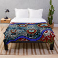Authentic aboriginal inspired plush blanket with traditional dot patterns