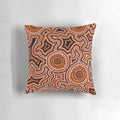 Authentic Aboriginal-inspired pillow design featuring traditional dot patterns and indigenous motifs.