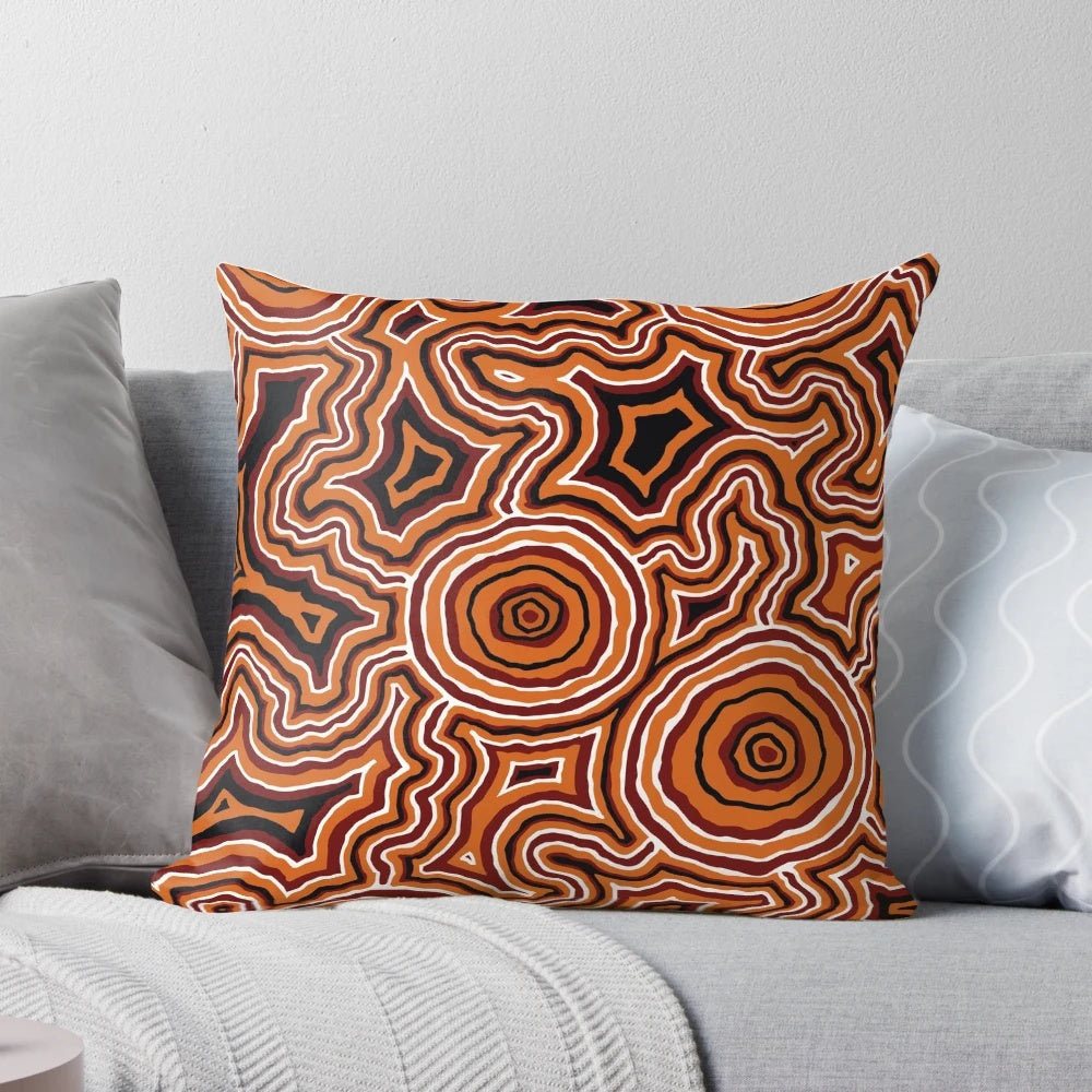 Authentic Aboriginal-inspired pillow design featuring traditional dot patterns and indigenous motifs.