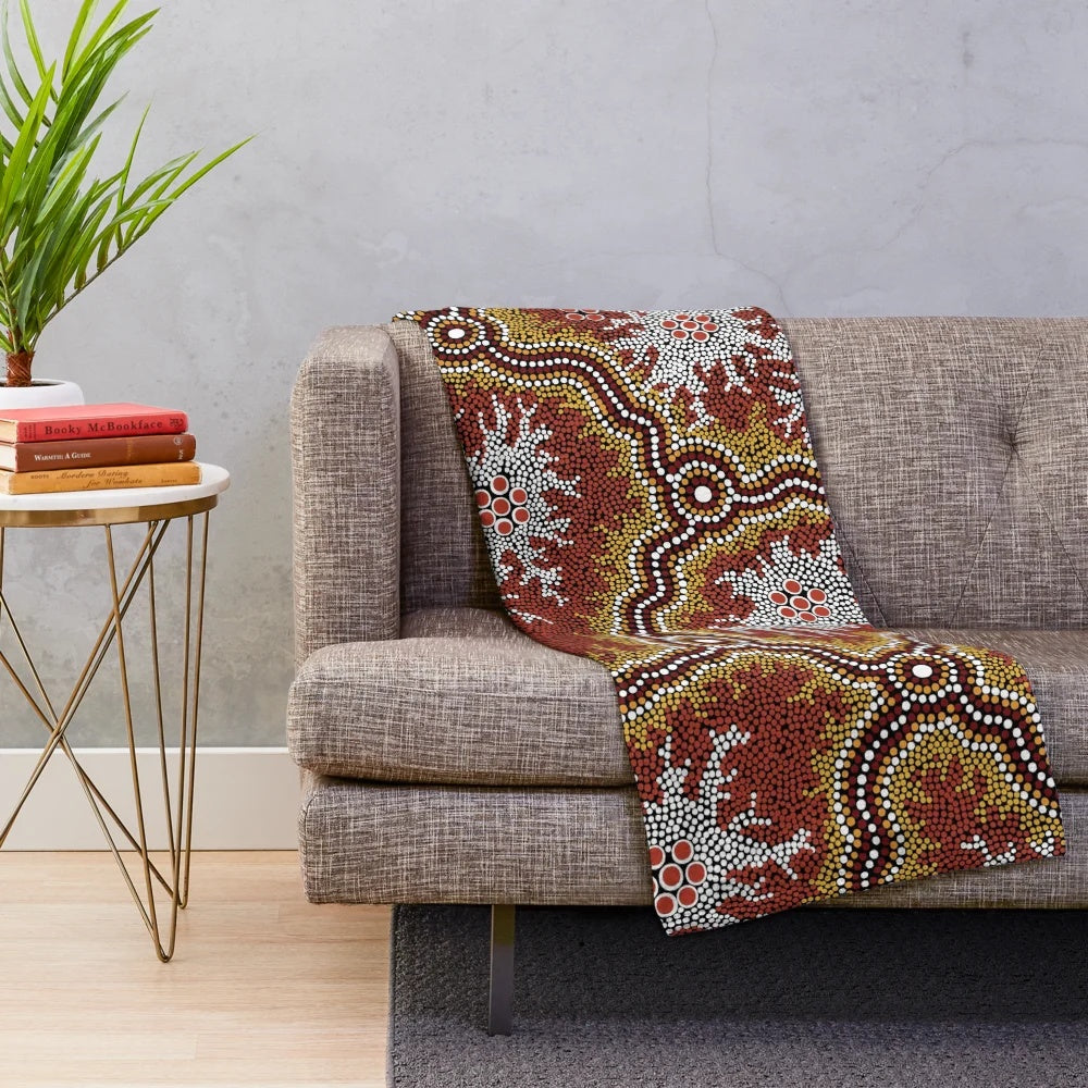 Plush blanket featuring an aboriginal-inspired mountains design