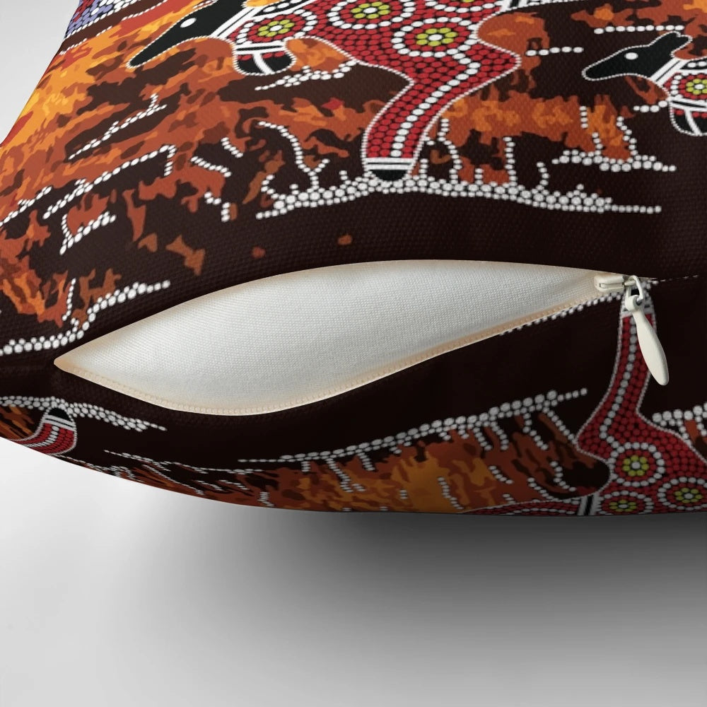 Pillow featuring a landscape design inspired by the iconic Uluru rock formation in the Australian outback, with aboriginal dot art elements.