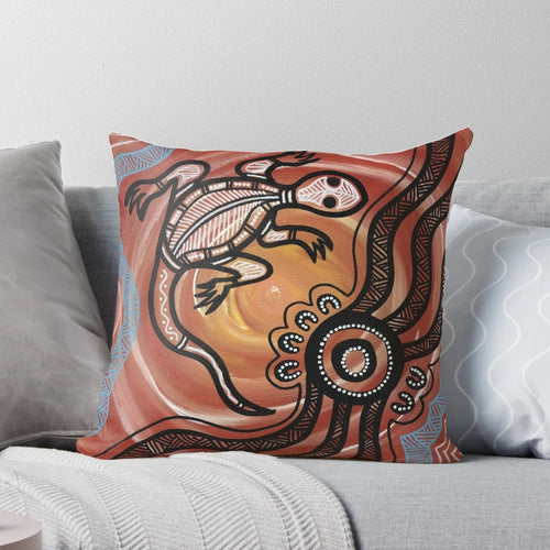 Vibrant acrylic painting of a lizard/goanna on a decorative throw pillow, showcasing authentic aboriginal art from Australia.