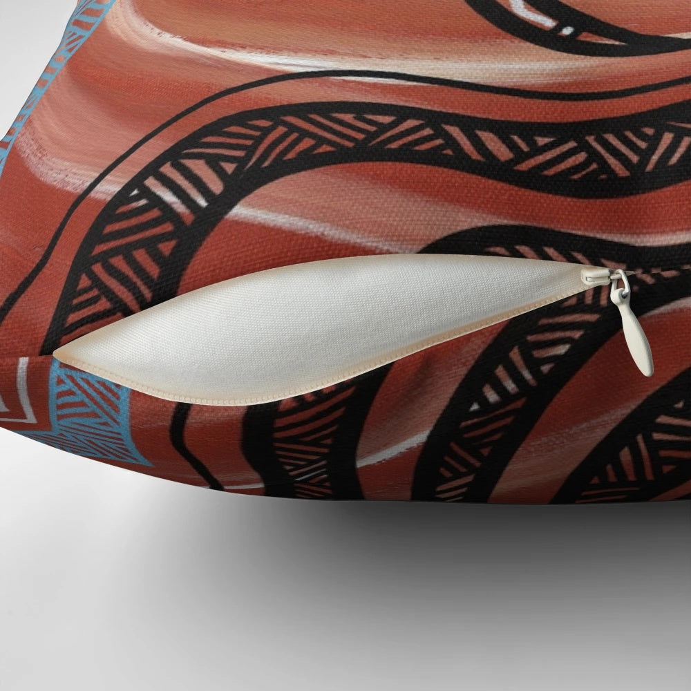 Vibrant acrylic painting of a lizard/goanna on a decorative throw pillow, showcasing authentic aboriginal art from Australia.