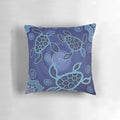 Decorative throw pillow featuring an authentic aboriginal art design of sea turtles in blue, black, and ochre colors.