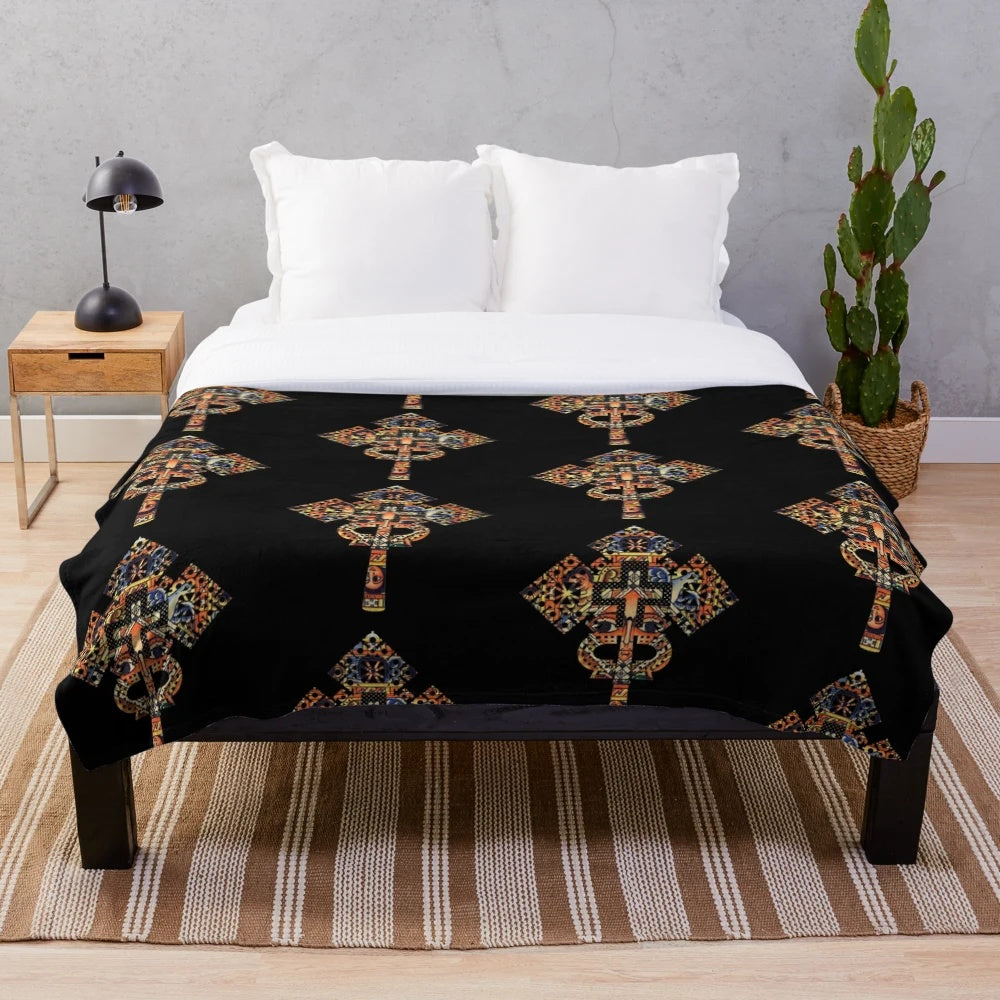 Plush blanket featuring an authentic African-inspired Ethiopian cross design