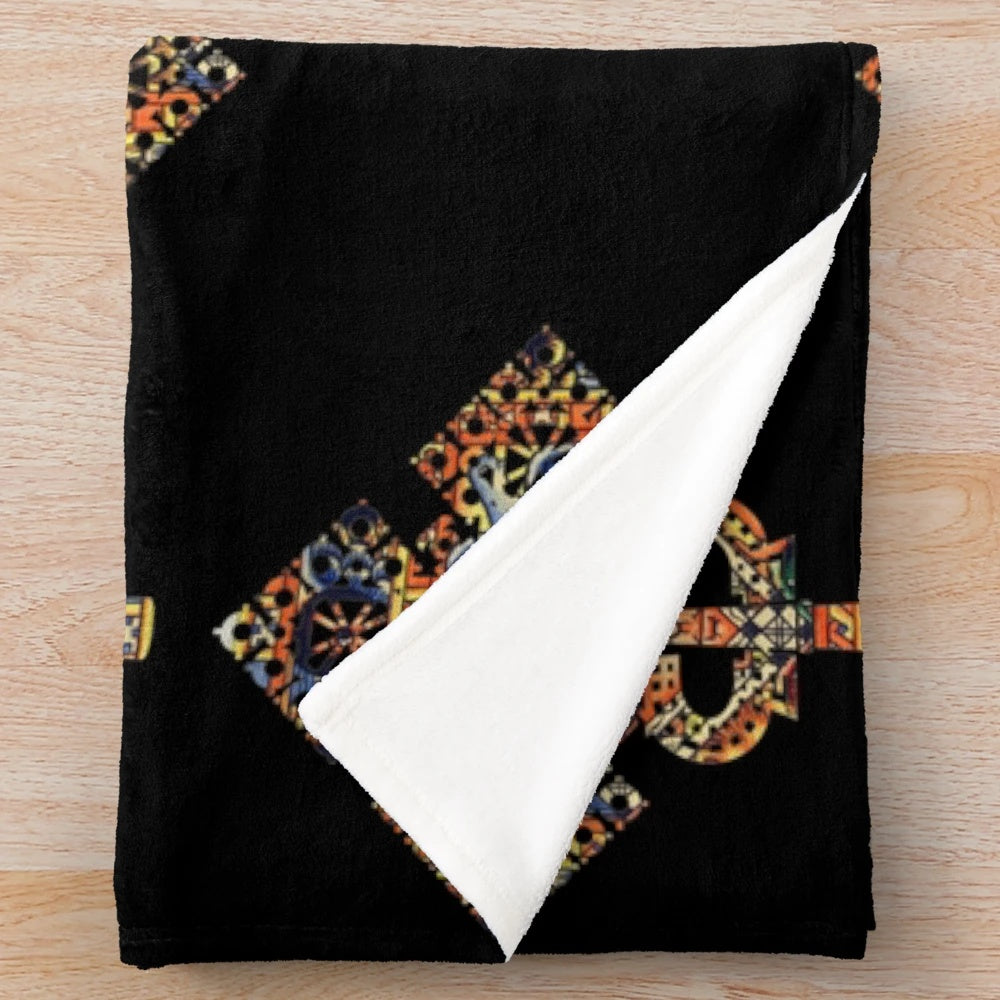 Plush blanket featuring an authentic African-inspired Ethiopian cross design