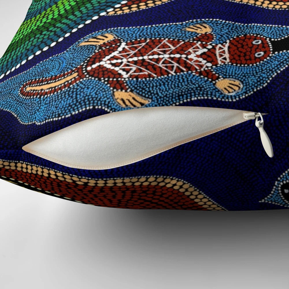 Colorful Australian aboriginal dot painting style design featuring a playful platypus on a soft, comfortable pillow.