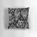 A black and white traditional tattoo flash pattern pillow for gothic and punk bedroom or home decor.
