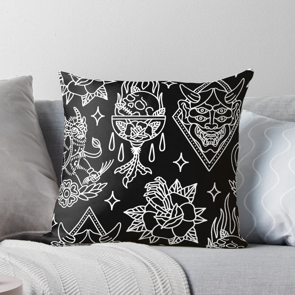 A black and white traditional tattoo flash pattern pillow for gothic and punk bedroom or home decor.