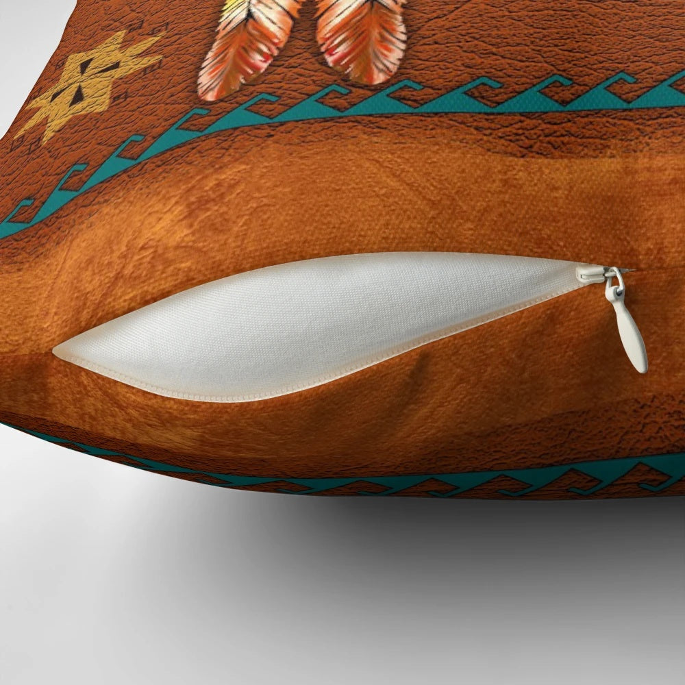 Handcrafted buffalo leather pillow adorned with southwestern-inspired design