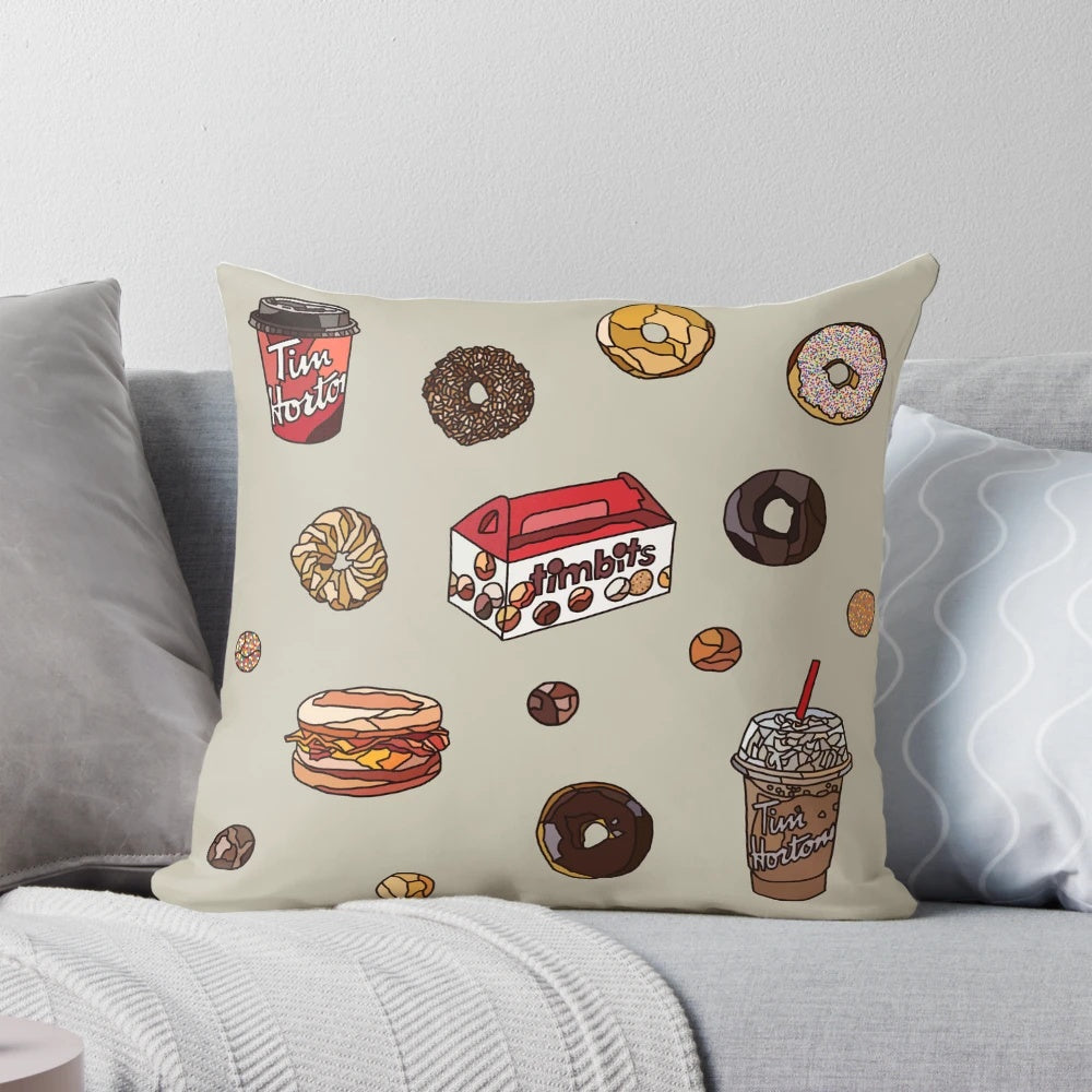 A cozy pillow featuring the iconic Canadian Timbits donuts from Tim Hortons.