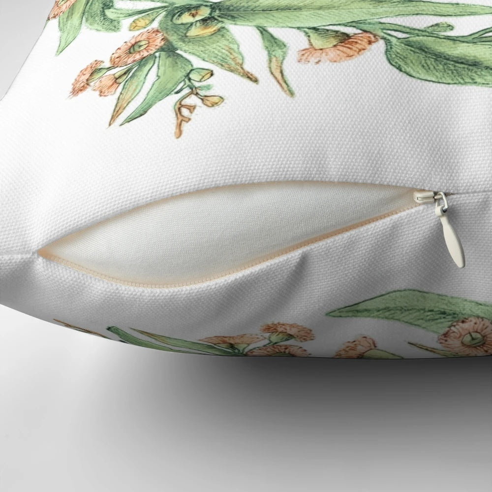 Eucalyptus wreath on a neutral-colored pillow, creating a natural and botanical home accent.
