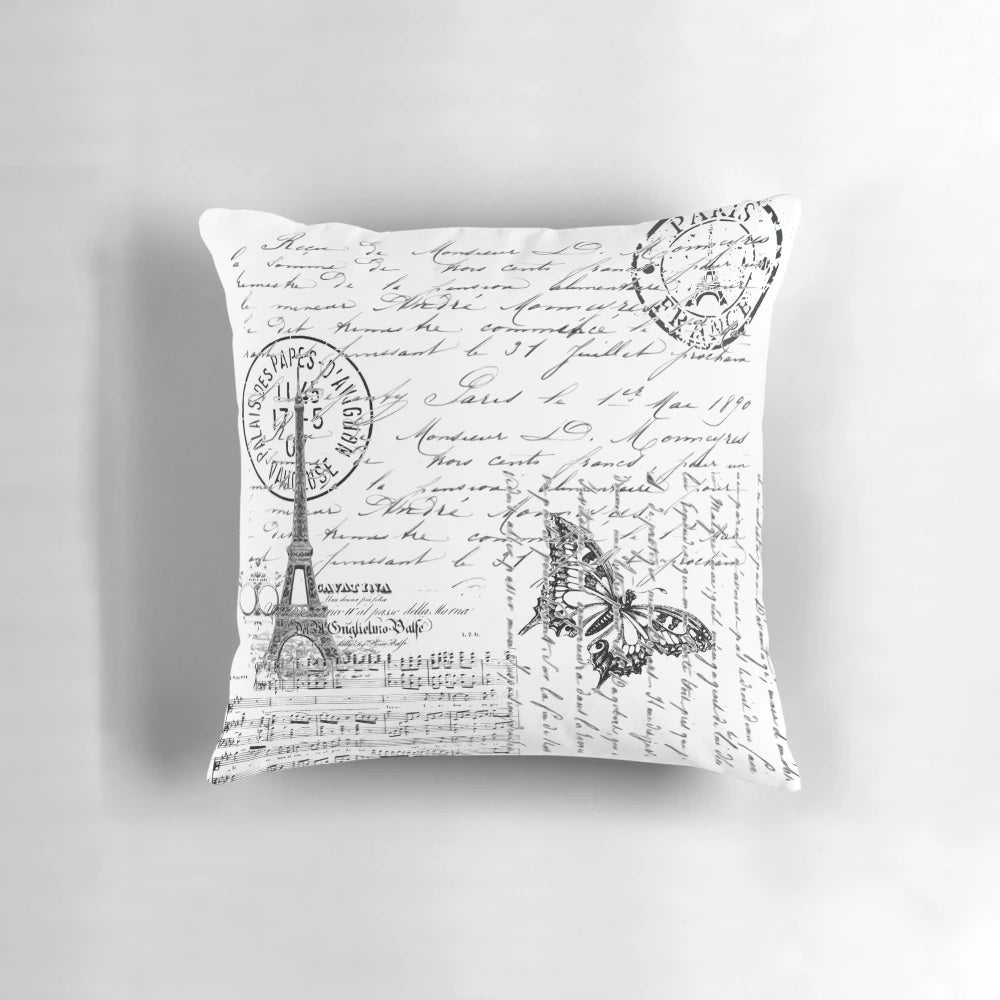 French-inspired throw pillow with Eiffel Tower, butterflies, and French script