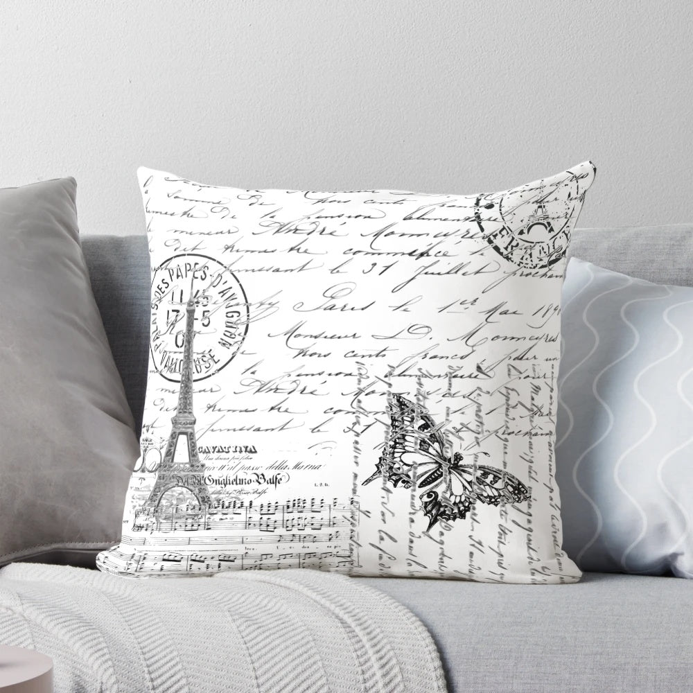 French-inspired throw pillow with Eiffel Tower, butterflies, and French script