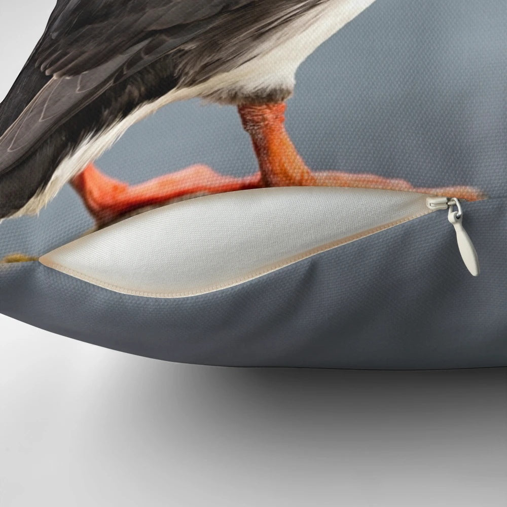 Decorative throw pillow featuring a stunning photograph of a puffin in its natural Icelandic habitat