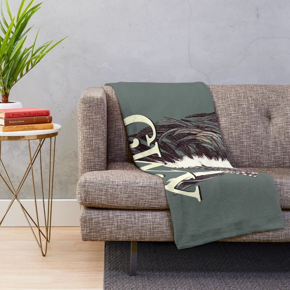 Soft and cozy plush blanket featuring a Cherokee headdress design