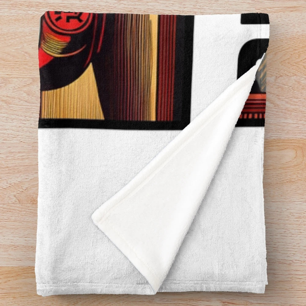 Japanese Daruma doll plush blanket featuring traditional illustration