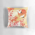 Decorative pillow featuring Japanese-inspired patterns, including sakura, plum flowers, and origami cranes.