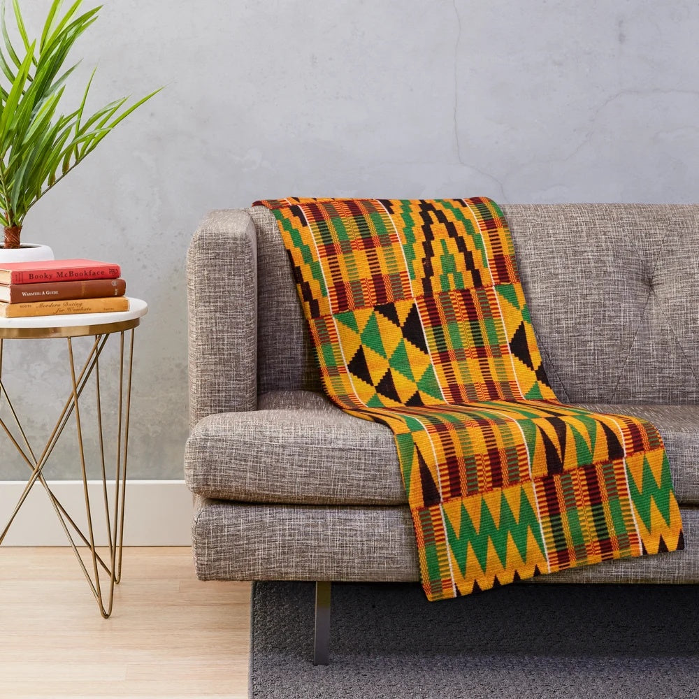 Plush African blanket featuring an authentic kente cloth pattern design
