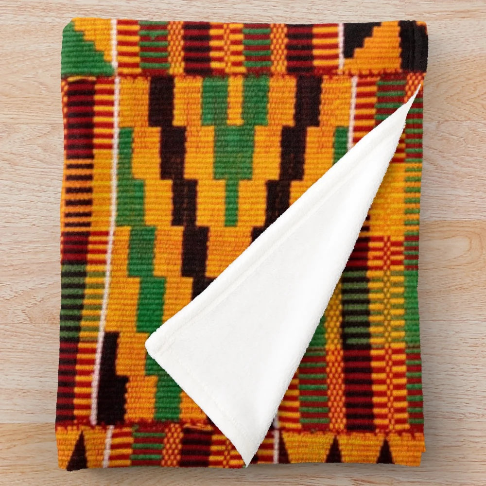 Plush African blanket featuring an authentic kente cloth pattern design