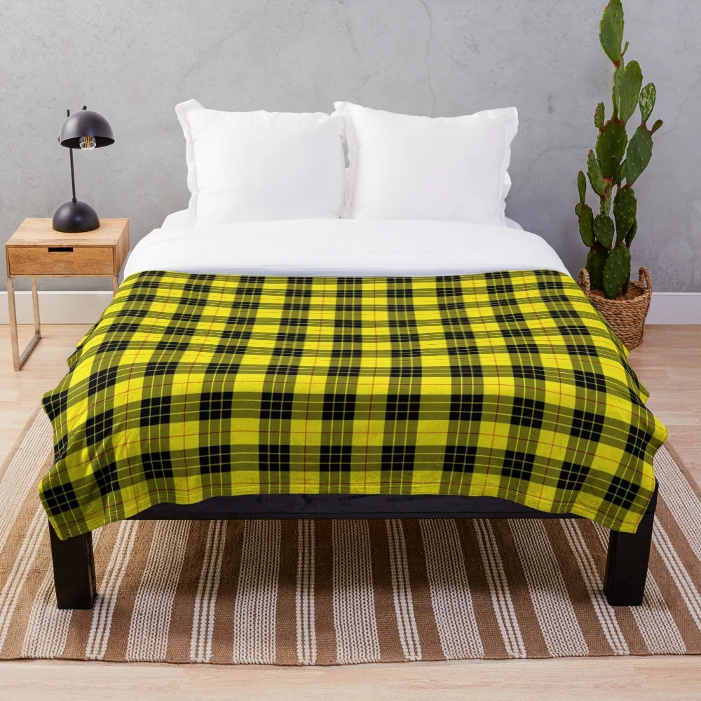 Macleod tartan plush blanket featuring traditional Scottish clan design