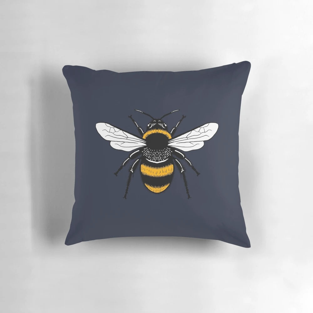 Manchester bee worker symbol on a soft, plush pillow
