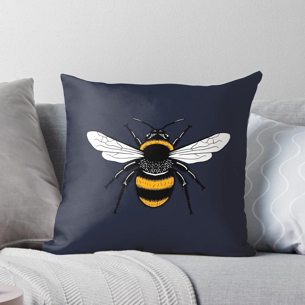 Manchester bee worker symbol on a soft, plush pillow