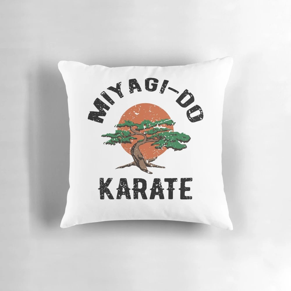 Miyagi Do Karate themed decorative pillow featuring a bonsai tree and karate chop design