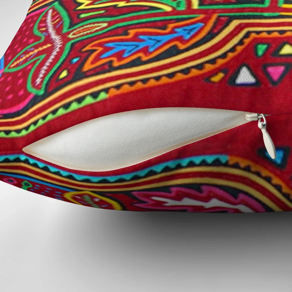 Vibrant and colorful Mola de Panama pillow, featuring traditional Panamanian textile art.