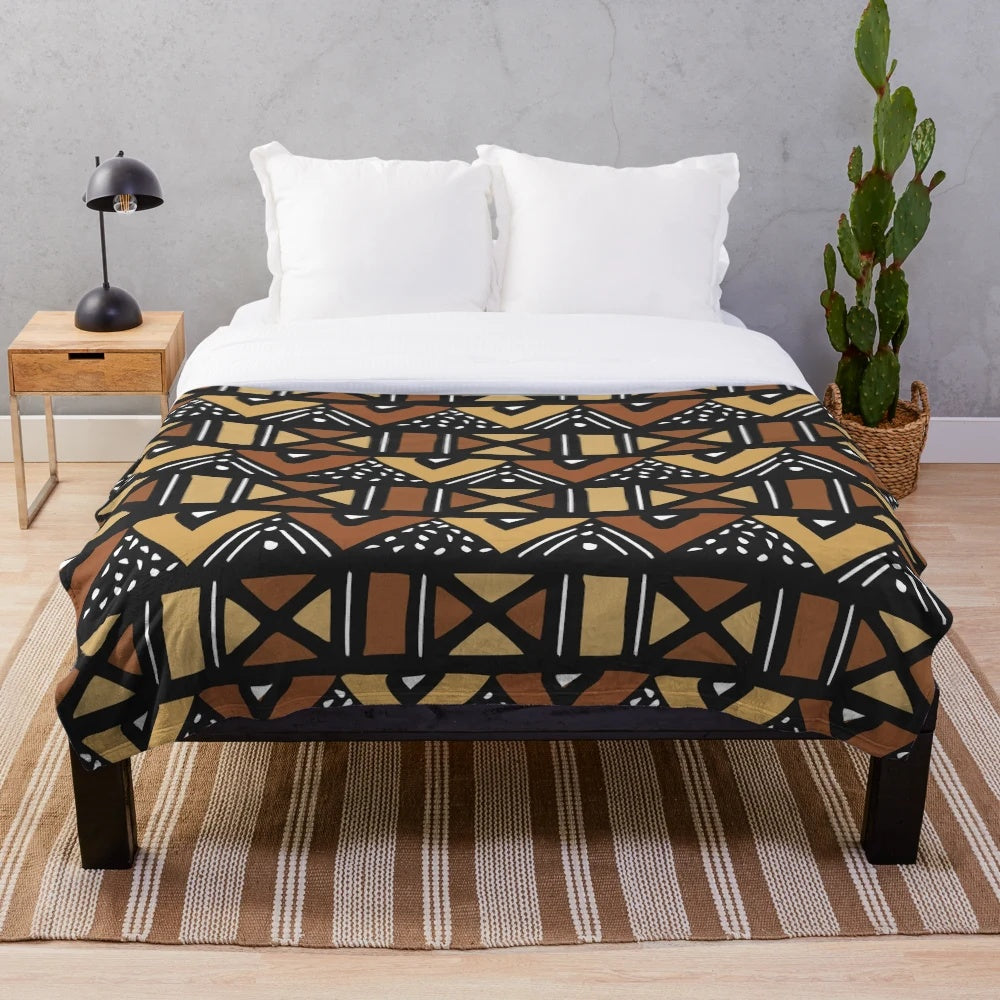 Mud cloth inspired brown, black, and red plush blanket