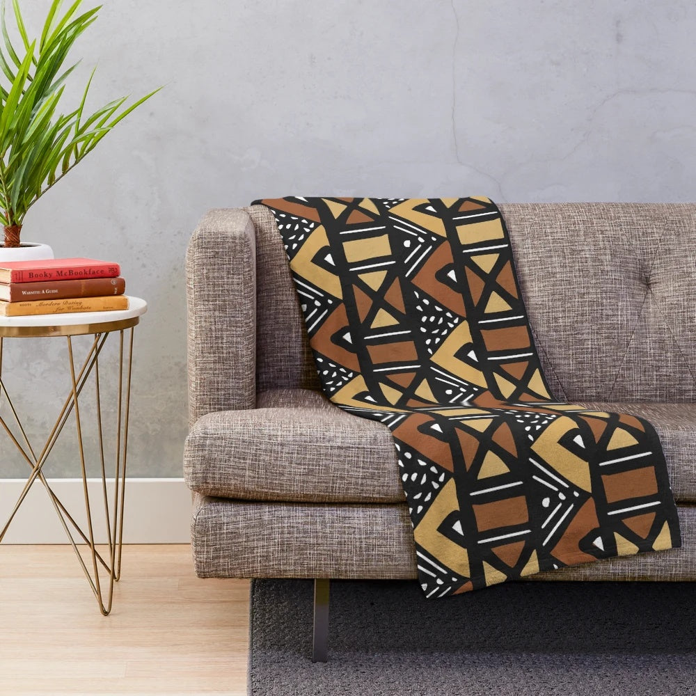 Mud cloth inspired brown, black, and red plush blanket