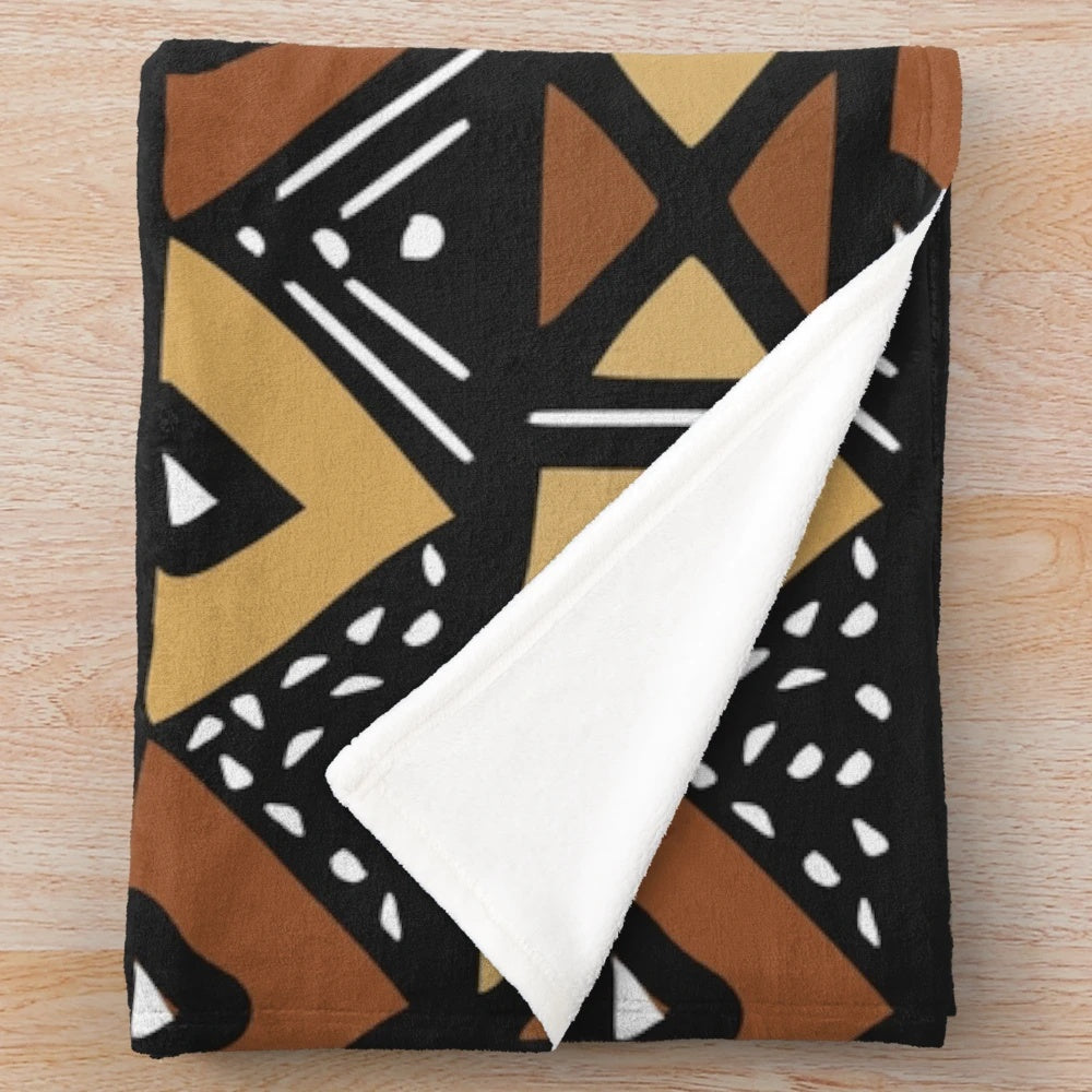 Mud cloth inspired brown, black, and red plush blanket