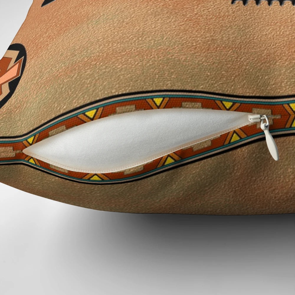 A vibrant pillow featuring a crow, a symbol of transformation in Native American cultures
