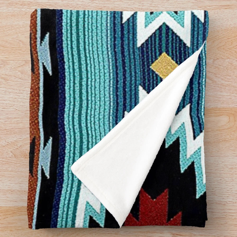 Navajo-inspired plush blanket with southwestern art design