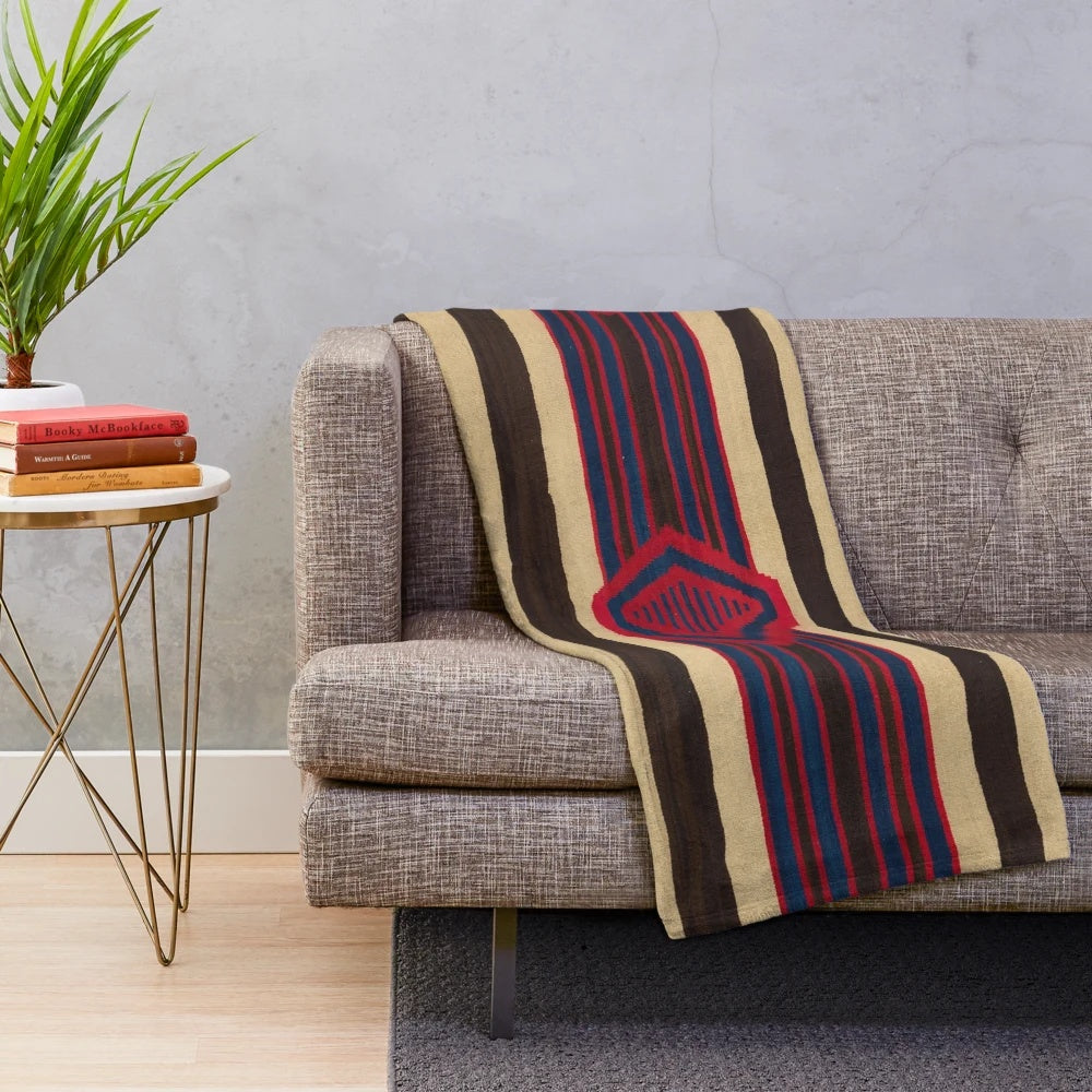 Plush blanket featuring Navajo-inspired indigenous designs