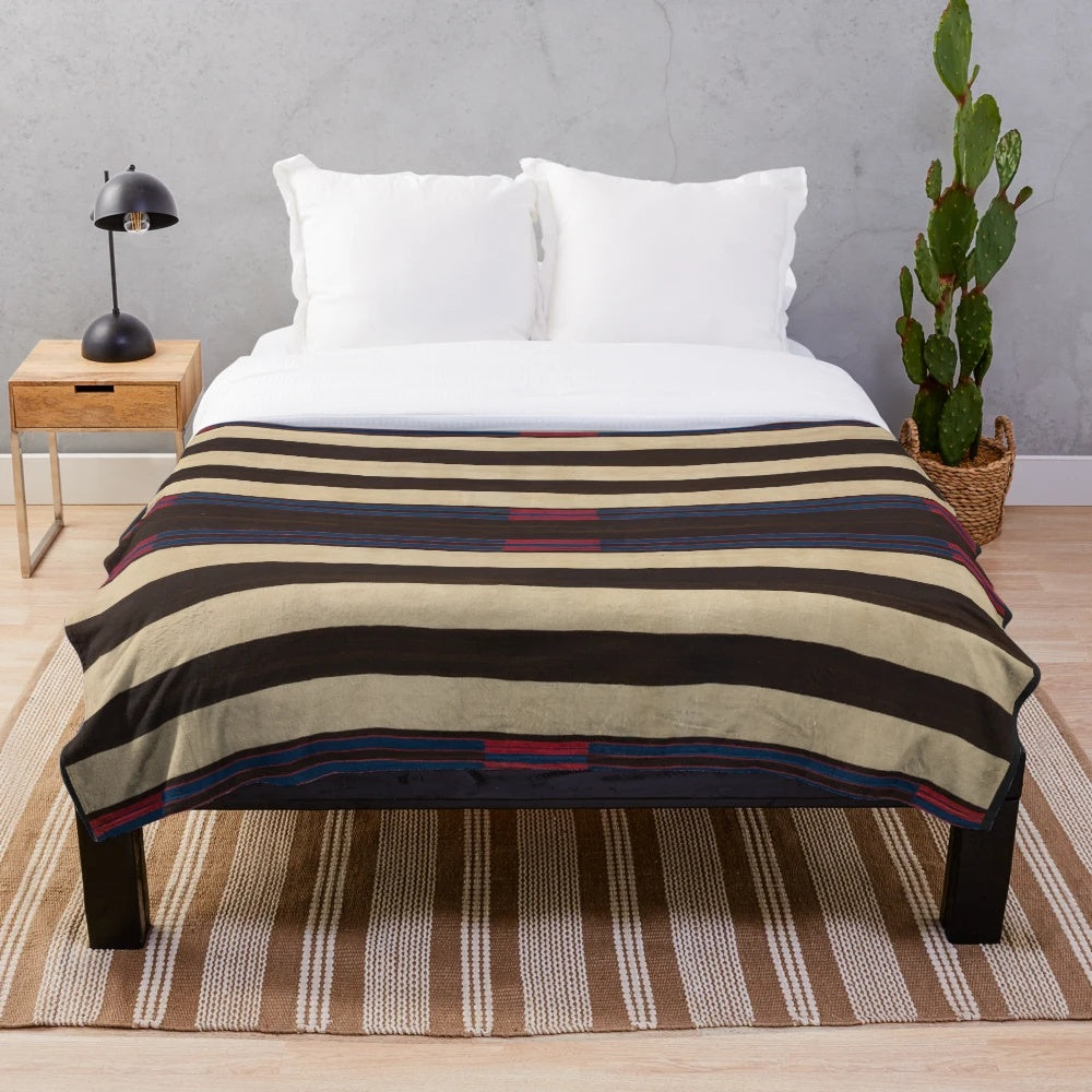 Cozy plush blanket featuring traditional Navajo weavings and designs