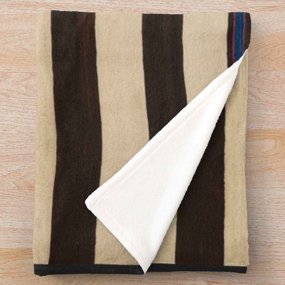 Cozy plush blanket featuring traditional Navajo weavings and designs