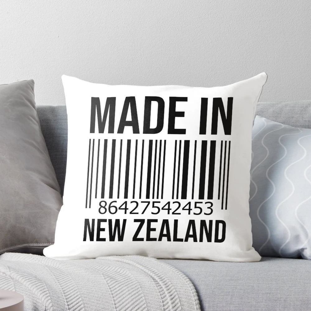 Soft, plush pillow featuring the iconic silver fern, a symbol of New Zealand