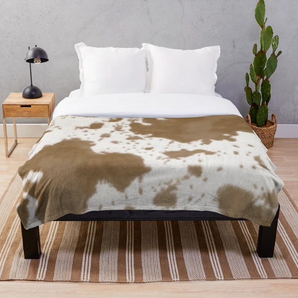 Nguni cattle hide plush blanket with traditional African pattern