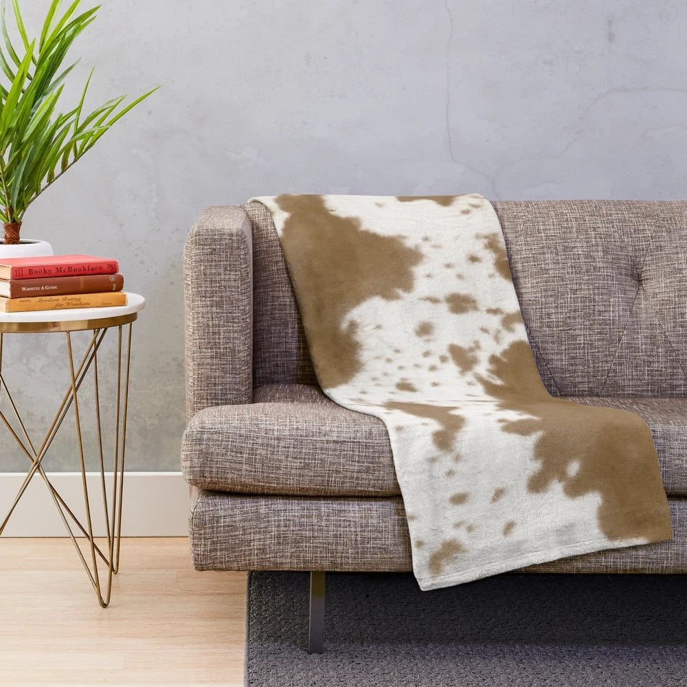 Nguni cattle hide plush blanket with traditional African pattern