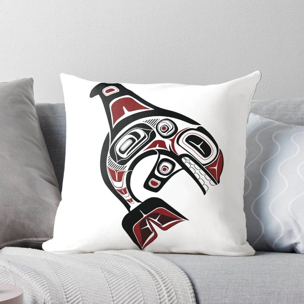 Vibrant Pacific Northwest orca killer whale design in traditional Salish formline art style on a decorative pillow