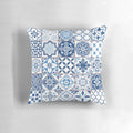 Close-up of a decorative pillow with a vibrant Portuguese azulejo-inspired pattern