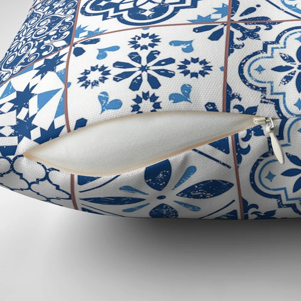 Close-up of a decorative pillow with a vibrant Portuguese azulejo-inspired pattern