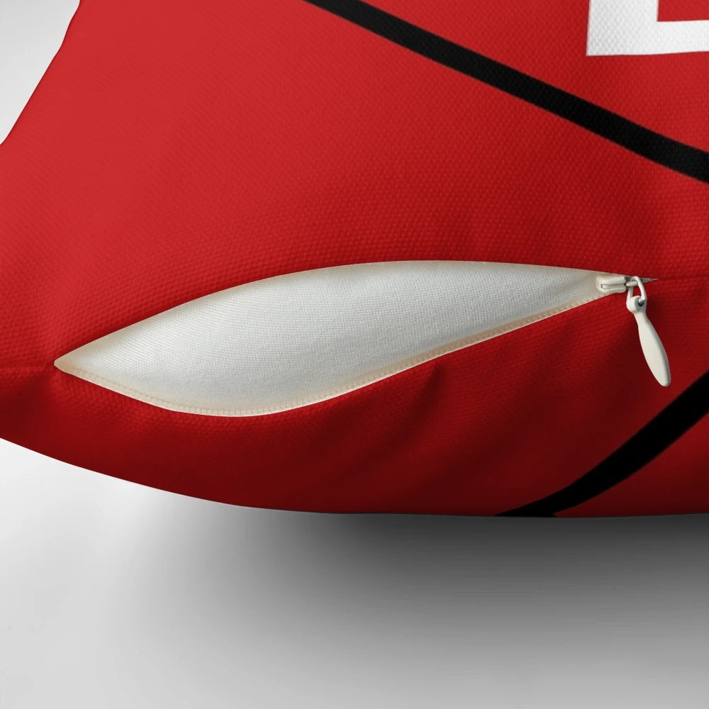 Vibrant RC Lens Pillow featuring the club's logo and colors